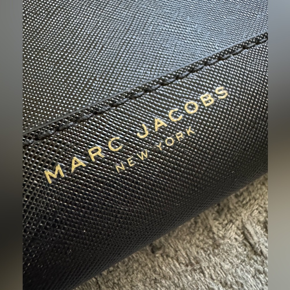 The Marc Jacobs Saffiano Leather Zip Around
Continental Wallet - $195 MSRP - Picture 5 of 8